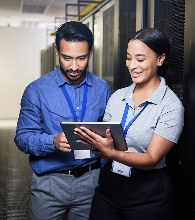 Business man and woman in data center